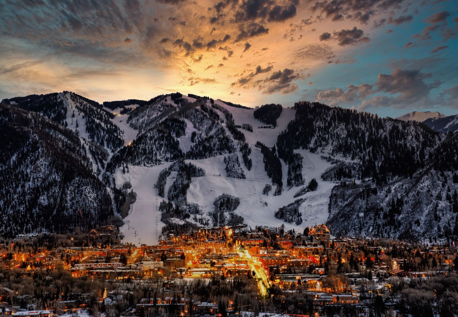 Telluride Village at the base of Telluride Mountain at Sunset in Winter near Chipeta Lodge Resort + Spa