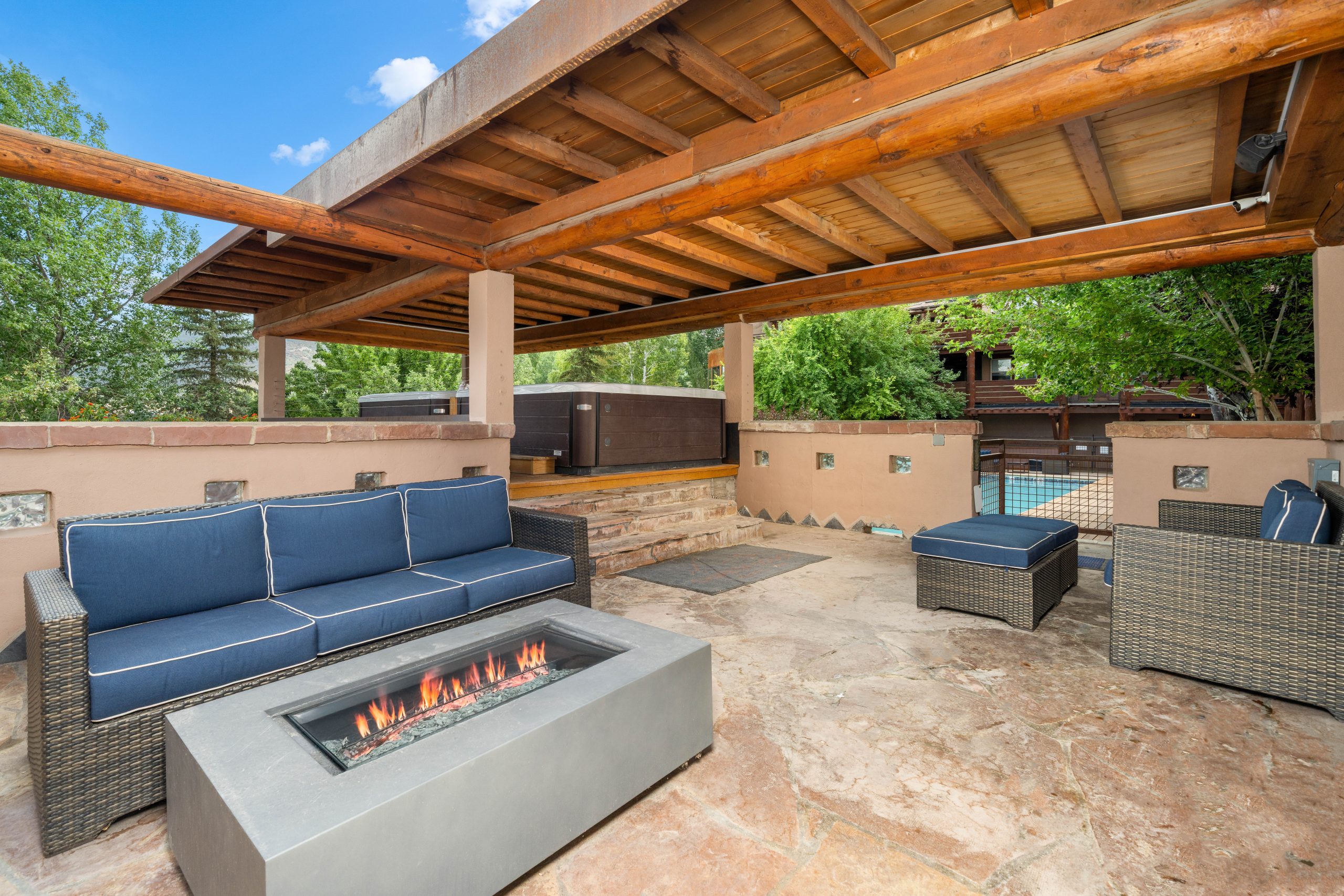 Gathering Space Terrace with Fire Pit and Hot Tubs at Chipeta Lodge Resort + Spa