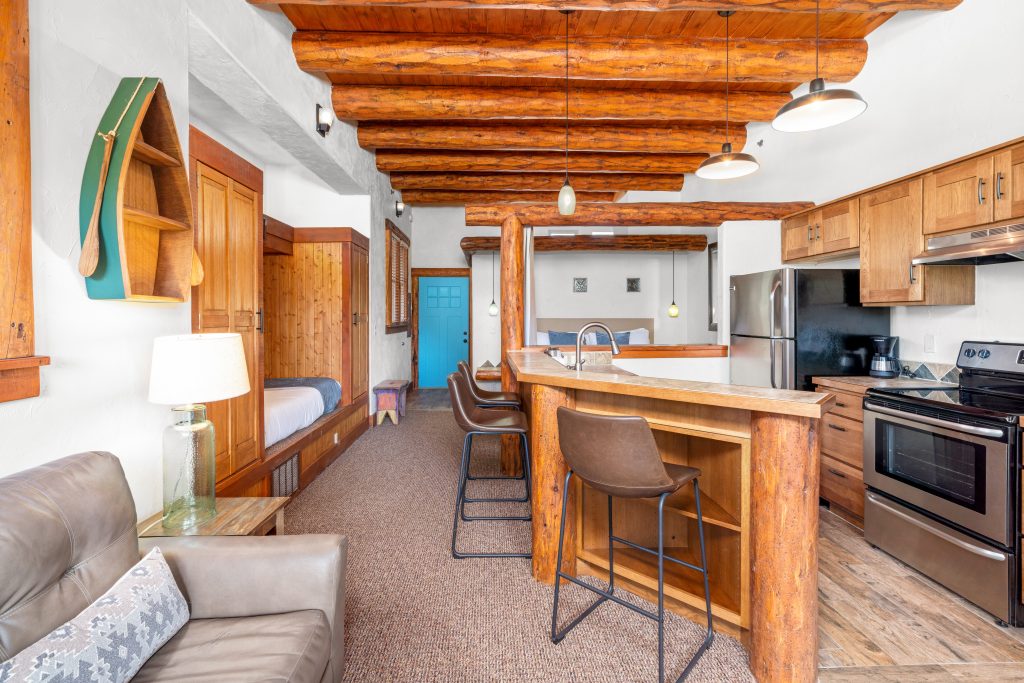 Chipeta-Lodge_LoCha-Family-Suite-Seating-Kitchen - Chipeta Lodge Resort + Spa Family Suite Kitchen and Seating Area in the LoCha Building at Chipeta Lodge Resort + Spa