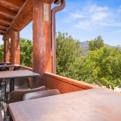 Outdoor seating at the White Buffalo Restaurant + Bar at Chipeta Lodge Resort + Spa