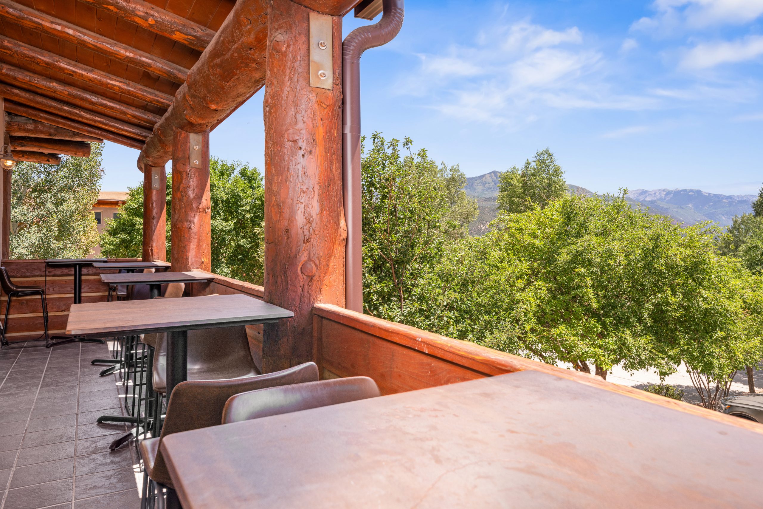 Outdoor seating at the White Buffalo Restaurant + Bar at Chipeta Lodge Resort + Spa