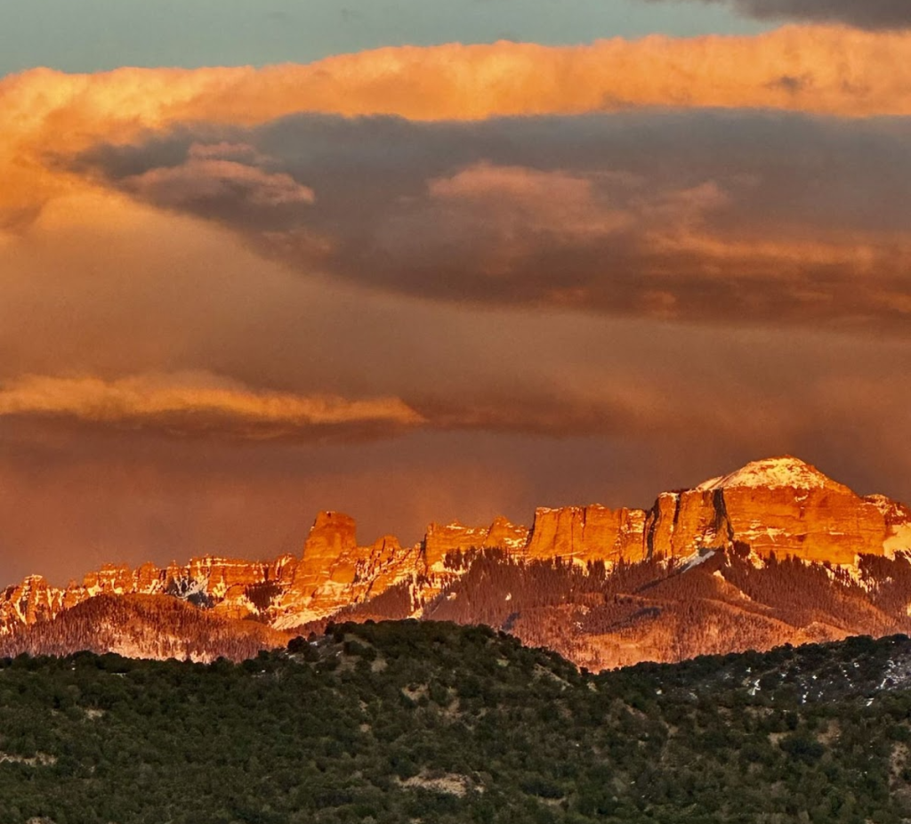 Alpenglow at sunset on the San Juan Mountains above Ridgway Colorado and the Chipeta Lodge Resort + Spa