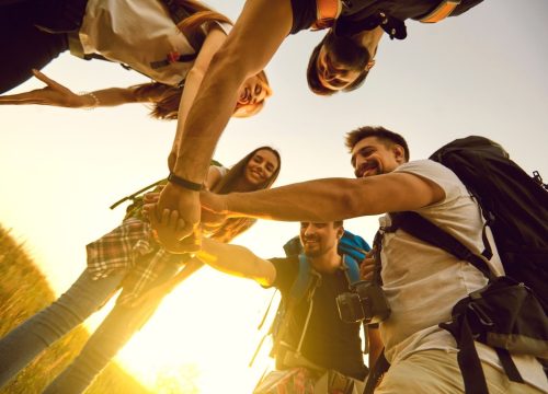 Team building in the mountains as the sun sets near Chipeta Lodge Resort + Spa