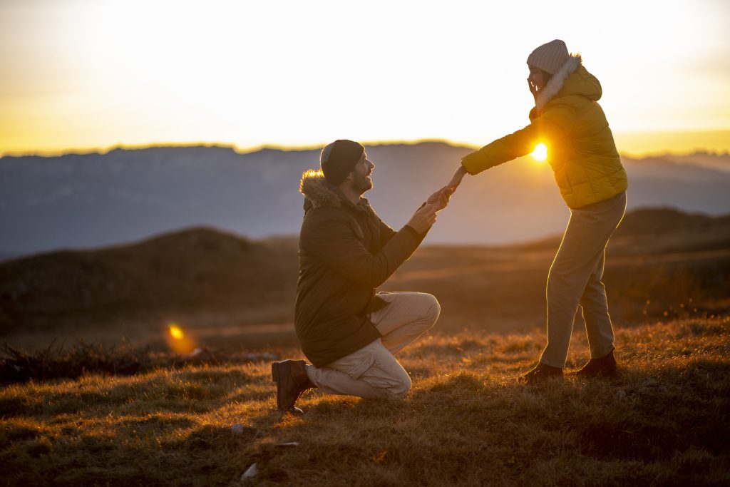 Wedding proposal at sunset in the mountains near Chipeta Lodge Resort + Spa