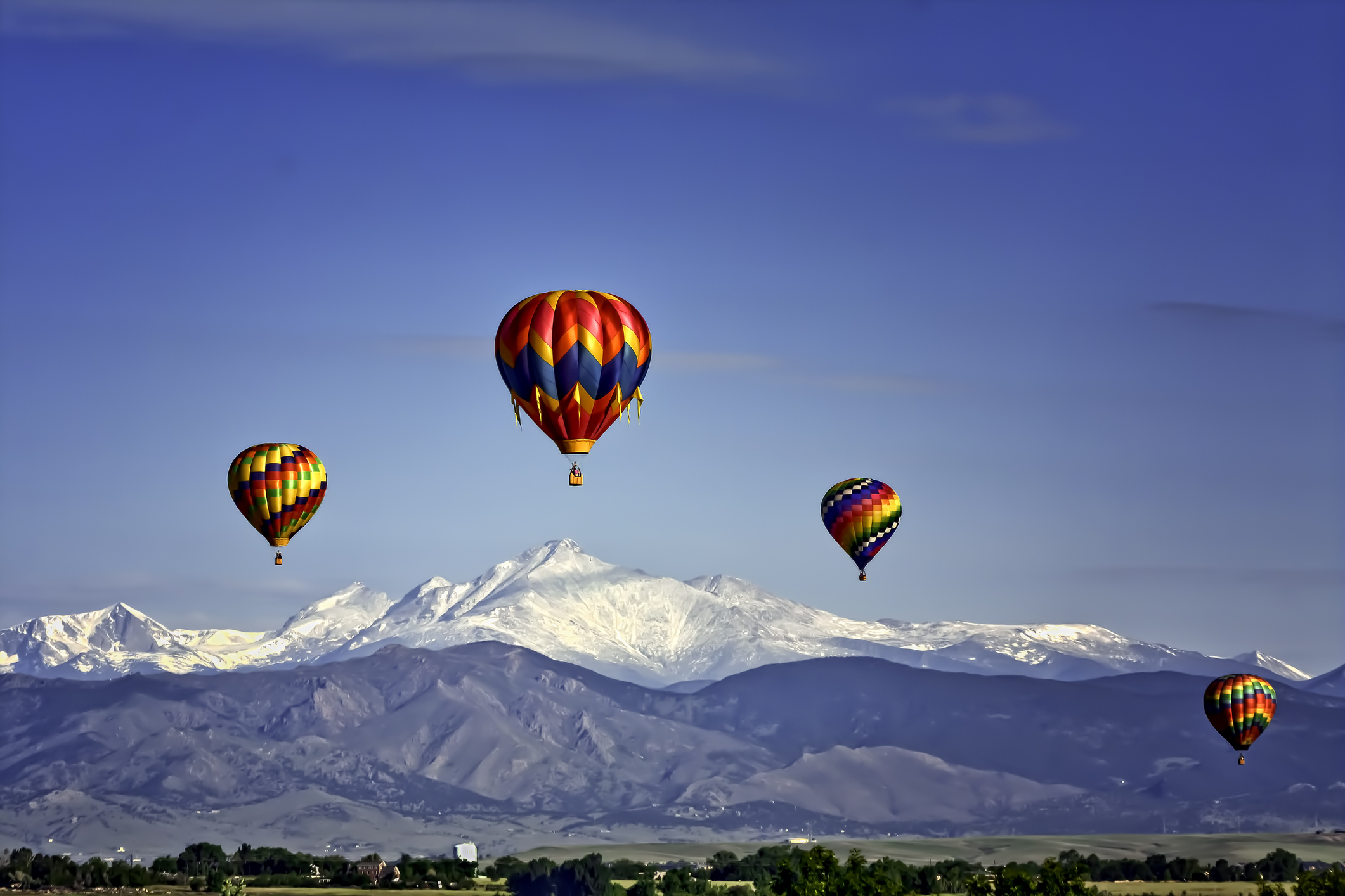 Hot air balloons over the Rocky Mountains in Colorad near Chipeta Lodge Resort + Spa