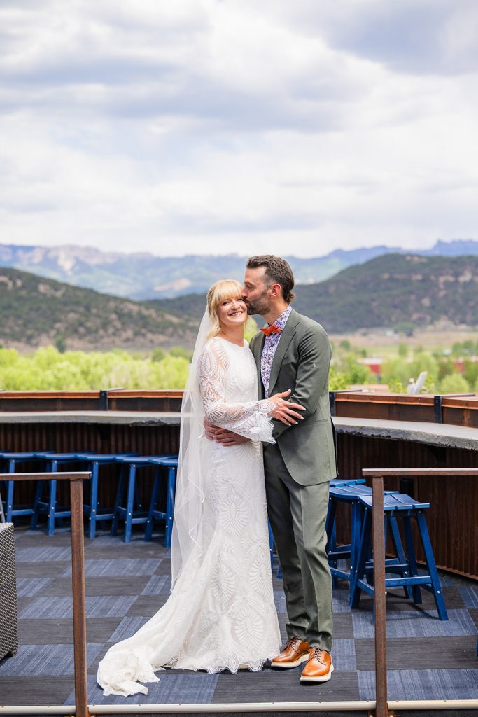 Bride and Groom on Rooftop Bar at Chipeta Lodge Resort + Spa