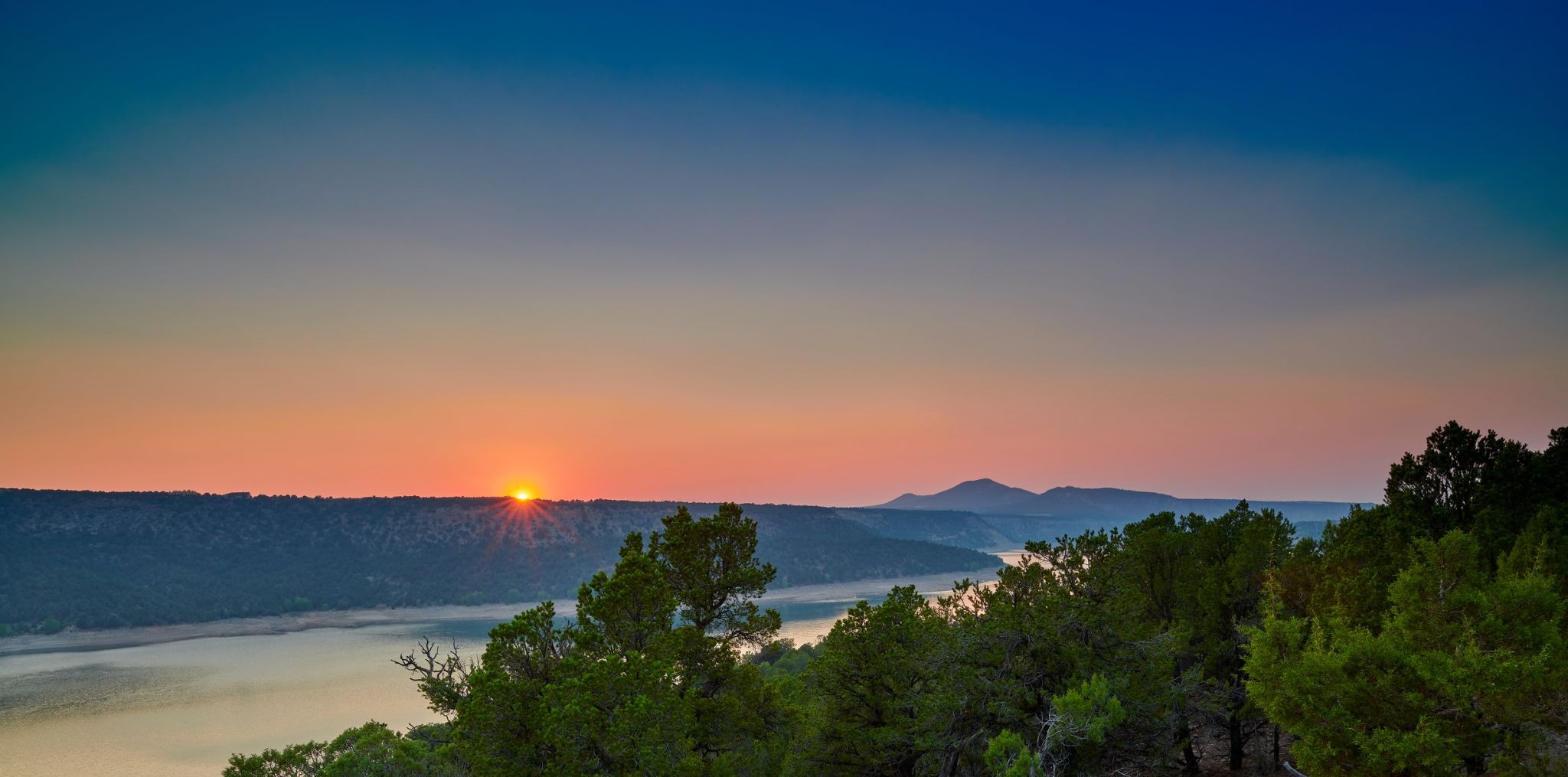 Sunset over Ridgway State Park and Reservoir near Chipeta Lodge Resort + Spa