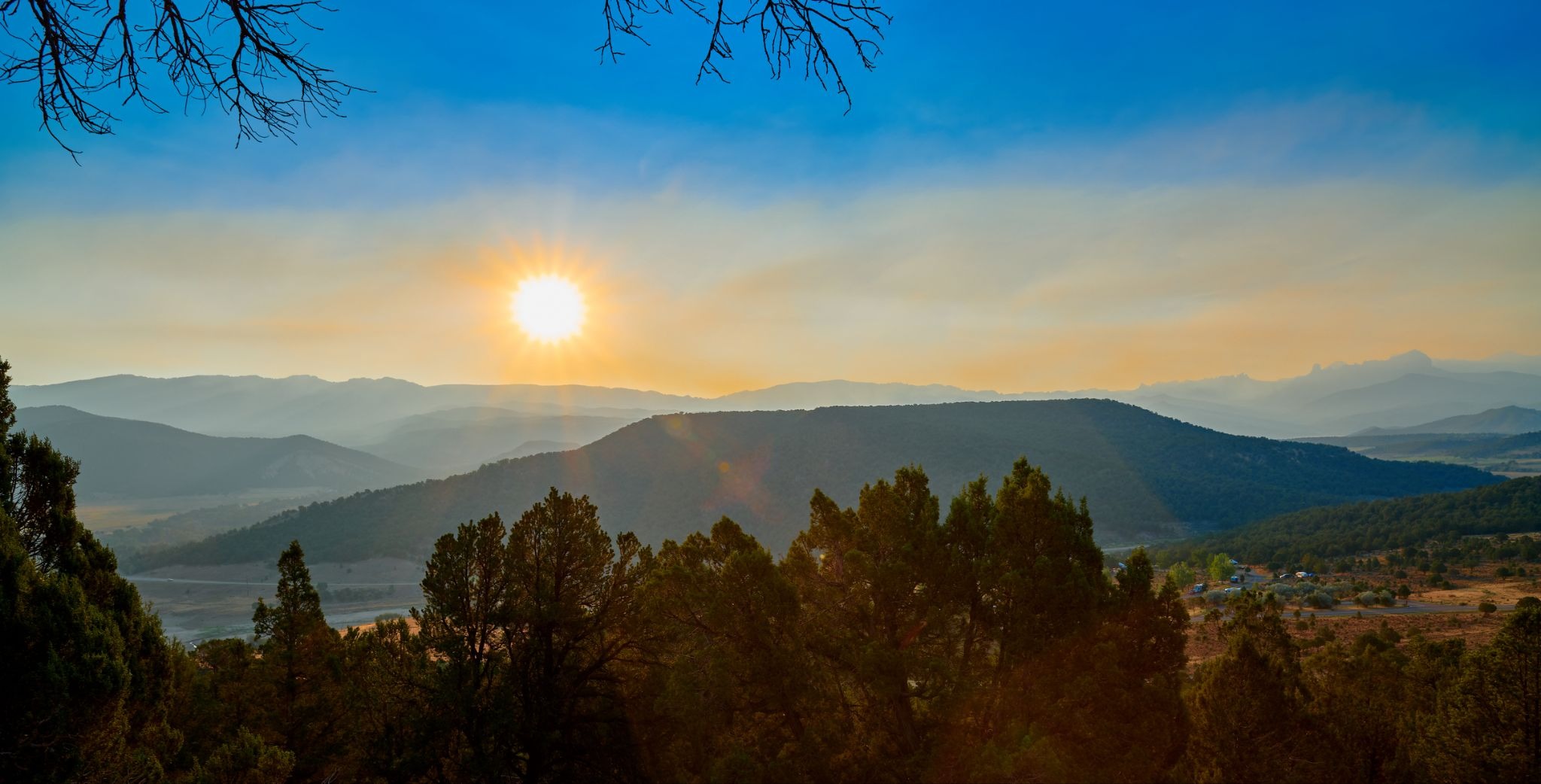 Sunrise over the Cimarron Range near Chipeta Lodge Resort + Spa