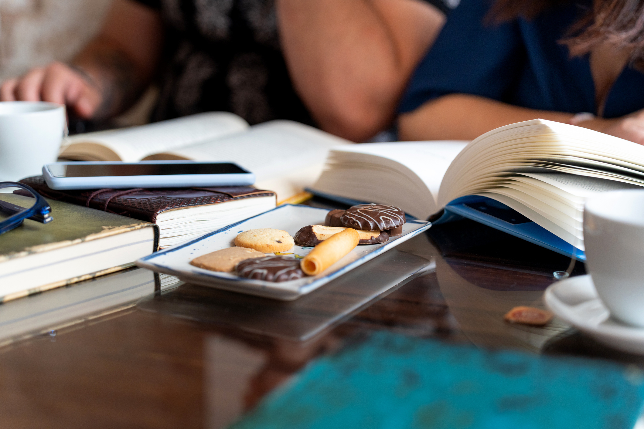 Enjoying books, discussion, coffee and cookies at Chipeta Lodge Resort + Spa